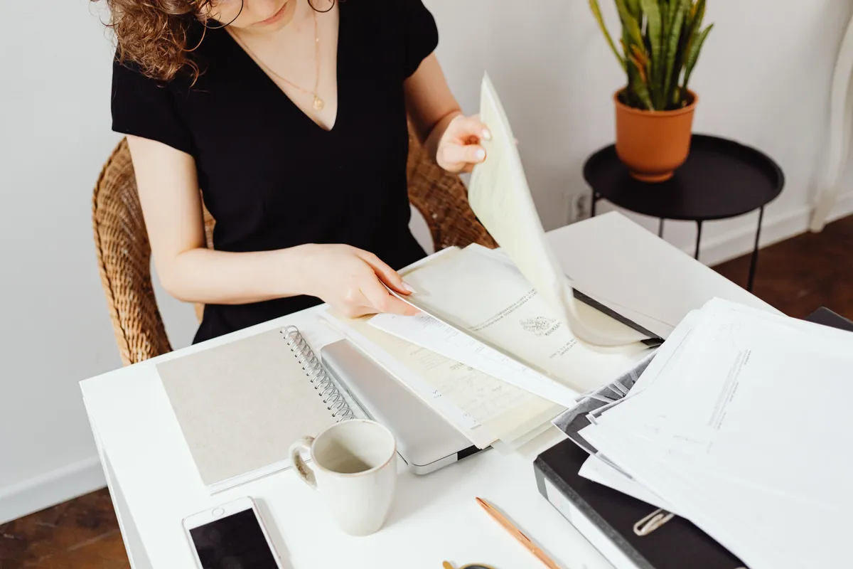 Real business papers and product details being checked on a desk